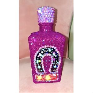 Empty Herradura tequila bedazzled bottle